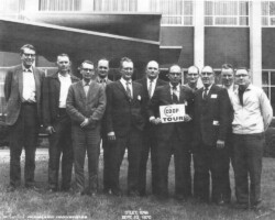 Photo of Farmers Coop Exchange Otley Tour 1970; 3rd from right Joe Horman, 3rd from left Blain Vreeslor, 2nd from left Donald Peery, 5th from left Francis Poortinga, 6th from left Bernie Vanee, 2nd from right Virgil Klyn, 4th from left Irvins Hoyser