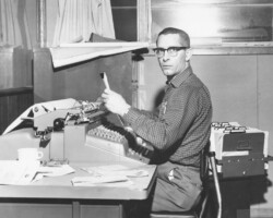 Photo from 1968 of a Farmers Coop Exchange Pella Employee Typing