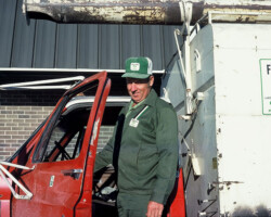 Photo of Art Klyn; employee of Farmer's Coop Exchange with the Pella Fuel Truck in Sept 1978