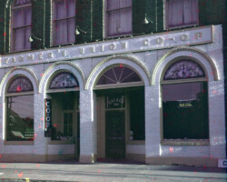Front of Farmer's Union Co-op on Franklin St. Building houses Pella Opera House today